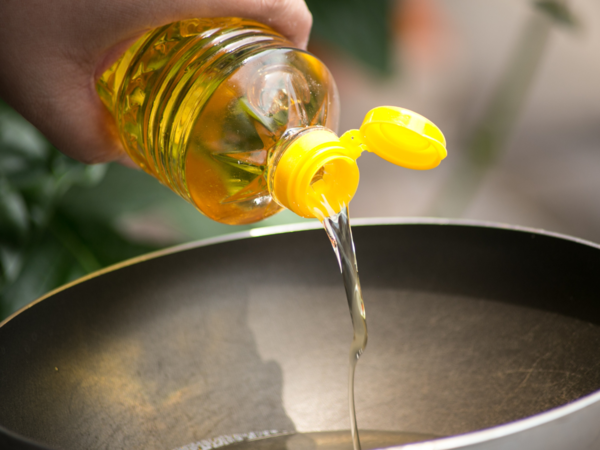 Bottles of vegetable oil on a shelf